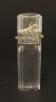 Lot 89 - An unusual clear glass scent bottle