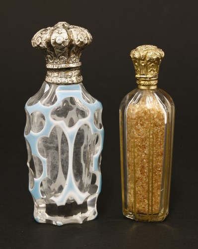 Lot 83 - Two Victorian clear glass scent bottles