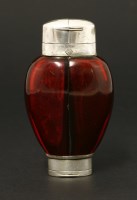 Lot 78 - An unusual Victorian cranberry glass double scent bottle and vinaigrette