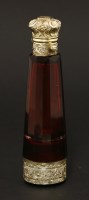 Lot 73 - A Victorian ruby glass combination scent bottle and vinaigrette