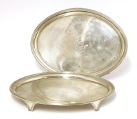 Lot 148 - A pair of George III silver oval card trays