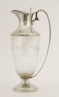 Lot 157 - A late Victorian silver and clear glass claret jug