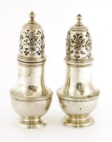 Lot 160 - Two George II silver casters