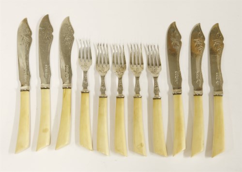Lot 182 - Twelve pairs of Edwardian silver and ivory-handled fish knives and fish forks