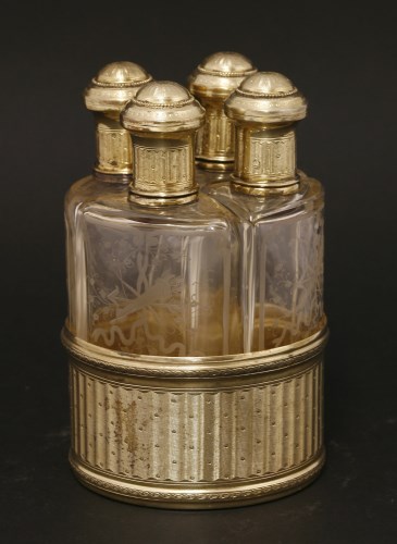 Lot 190 - A late 19th/early 20th century French silver gilt perfume bottle stand
