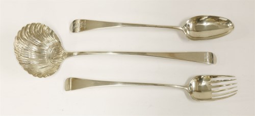 Lot 197 - A George III silver bottom-marked old English pattern soup ladle