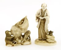 Lot 594 - Two Japanese ivory okimono
