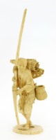 Lot 604 - A Japanese ivory okimono