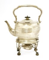 Lot 325 - A late Victorian silver tea kettle and stand