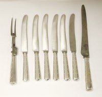 Lot 109 - A set of eighteen George III and later table knives