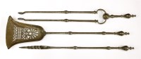 Lot 418 - A set of three George III polished steel fire irons