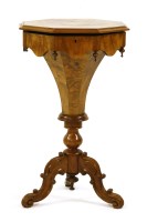 Lot 613 - A Victorian inlaid walnut trumpet-work table