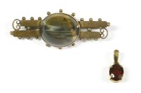 Lot 15 - A late Victorian Continental gold single stone hawk's eye two row bar brooch