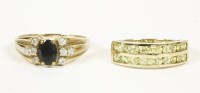 Lot 26 - A 9ct gold oval cut sapphire and cubic zirconia set ring
