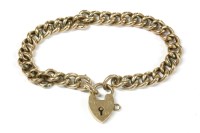 Lot 10 - A 9ct gold hollow curb link bracelet with gold padlock