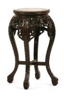 Lot 501 - A 19th century Chinese carved hardwood jardinière stand