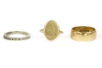 Lot 23 - A single cufflink converted to a ring with hand engraved crest
