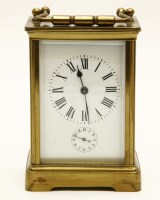 Lot 155 - A 20th century brass and five glass carriage clock