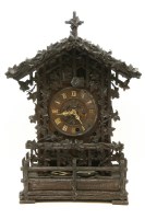 Lot 268 - A large carved wooden black forest cuckoo clock