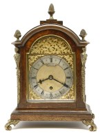 Lot 197 - An early 20th century oak cased mantel clock