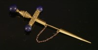 Lot 36 - A Victorian gold Etruscan Revival lapis lazuli sword and scabbard pin