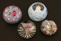 Lot 397 - Four paperweights in the manner of Paul Ysart
