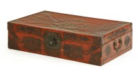 Lot 610 - A Chinese red embossed trunk