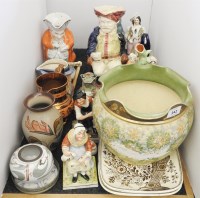 Lot 242 - Staffordshire figures and jugs
