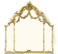 Lot 532 - A large gilt wood overmantel mirror