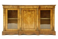 Lot 503 - A 19th century walnut breakfront credenza