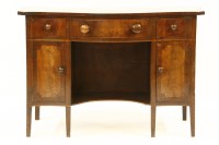 Lot 510 - A George III mahogany serpentine gentleman's dressing table