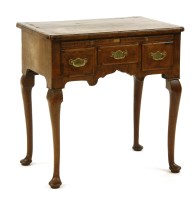 Lot 638 - A George I walnut lowboy