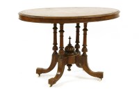 Lot 637 - A 19th century walnut oval centre table