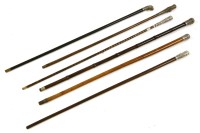 Lot 434 - Six Eastern white metal handled walking sticks