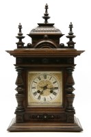 Lot 383 - A Continental walnut mantle clock