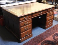 Lot 512 - A mahogany partners desk