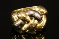 Lot 310 - An Italian two colour gold graduated plait ring