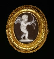 Lot 42 - A Victorian gold Etruscan Revival shell cameo brooch