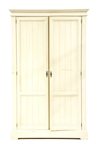 Lot 622 - A painted pine double wardrobe