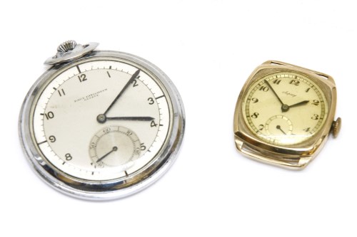 Lot 1 - A white metal open faced pocket watch