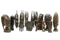 Lot 313 - A collection of tribal hardwood carvings
