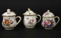 Lot 126 - Three 19th century porcelain chocolate cups and covers