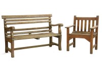 Lot 547 - A teak garden bench of slatted form