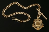 Lot 664 - A 9ct gold curb link graduated albert with T-bar and 9ct gold fob