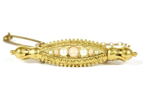 Lot 26 - A Victorian Etruscan style gold coral and split pearl brooch