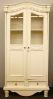 Lot 354 - A French style painted pine half glazed cupboard