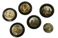 Lot 251 - Five framed pot lids and one on a pot