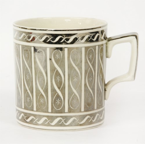 Lot 127 - A silver lustre pottery mug