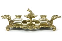 Lot 131 - A Victorian ornate brass ink stand