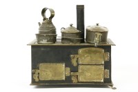 Lot 186 - A 19th century brass and tin plate dolls house range